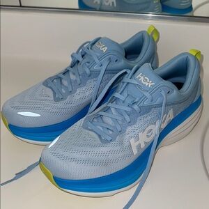 Brand new men’s Hoka Light Blue Athletic Sneakers with Lime Accents